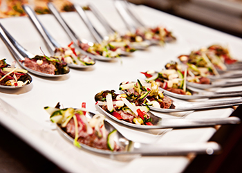 a plate of finger food, typically seen at a function a plate of finger food, typically seen at a function