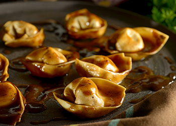 Stuffed tortelli of Ossobuco with truffled sauce Stuffed tortelli of Ossobuco with truffled sauce