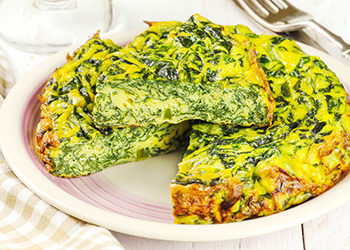 Homemade Italian spinach or Swiss chard frittata omelet Homemade Italian spinach or Swiss chard frittata omelet