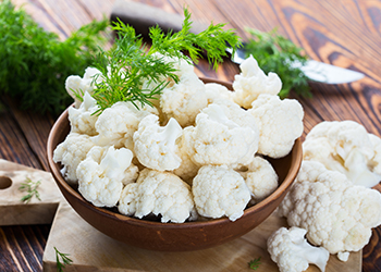 Fresh organic cauliflower cut into small pieces Fresh organic cauliflower cut into small pieces