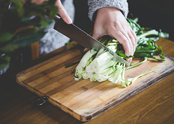 Woman Cuts Catalonia Chicory Woman Cuts Catalonia Chicory